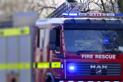 Fire in bathroom at thatched home in Stokeinteignhead