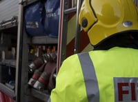 Village hall roof destroyed by fire as local crews join battle