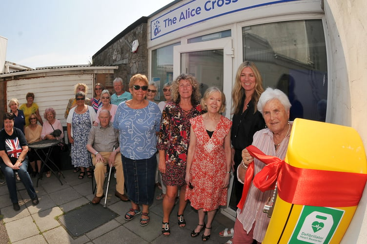 Defibrillator fitted at The Alice Cross Centre in Teignmouth is officially opened  with Viv Wilson MBE 