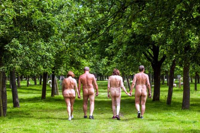 File photo of some naked walkers on Dartmoor.

 See SWNS story SWLNramble. A group of all-male naked ramblers spotted on a moor has sparked an online debate about whether it should be made illegal - and constitute sexual harassment. Six undressed men wearing only socks, boots and rucksacks, have been seen walking on Dartmoor in Devon. Following the sighting last month, one member of the public posted details prompting a discussion on whether naked rambling in popular public areas should be allowed. The Dartmoor National Park Authority confirmed naturism was not covered by its byelaws and said police could get involved if people were offended.  