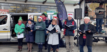 Dog owners and their four legged friends gather for carol service