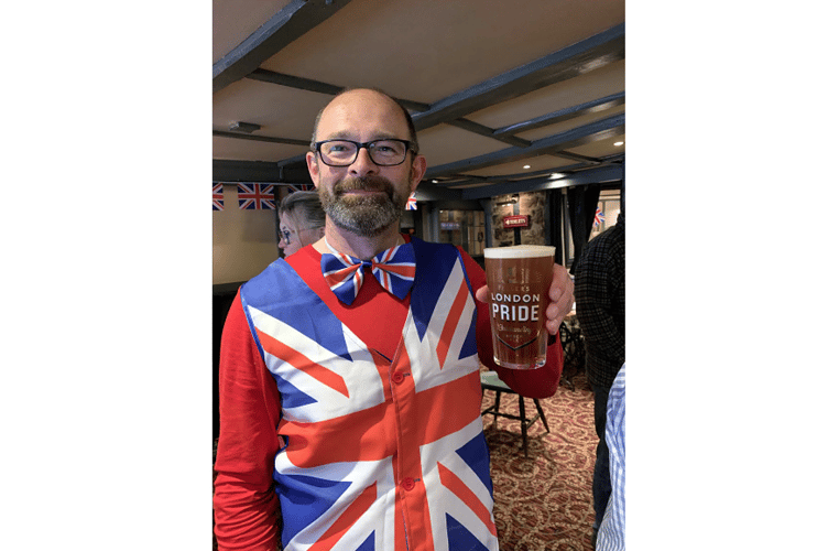 Bellringer Geoff Pring with a celebratory pint after a days hard work.