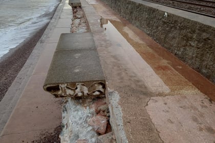 Sea wall closed off after storm damage 
