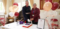 Volunteers celebrate award presentation 