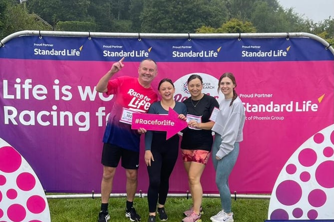 Left to right, Kevin Matthews, Beth Small, Helen Thatcher, Savannah Edmund from Dawlish Community Hospital take part in Race For Life 