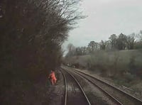 Rail worker missed oncoming train by two seconds, report says 