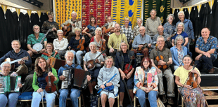 Mandolin orchestra to close MNDA fundraising event 