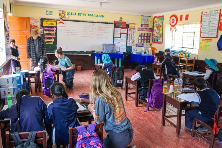 Students helped out at a school during their Peru trip. 