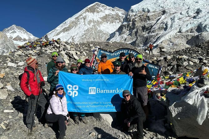 Ryan and his Coop collleagues at Everest Base Camp