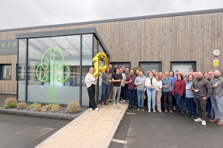 Baker Estates staff celebrate at the Newton Abbot headquarters.