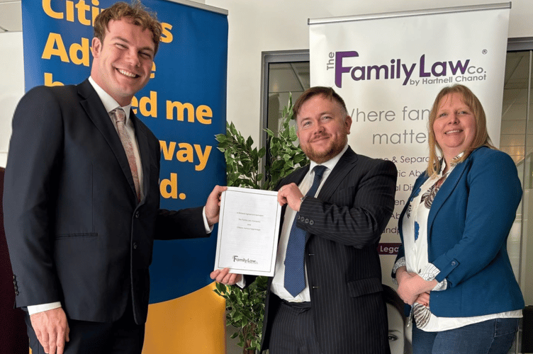 Thomas Glover and Kerry England from TFLC with (centre) Jacob Pritchard from Citizens Advice Teignbridge. Photo The Family Law Centre 